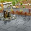 Glacier Slate slab patio surrounding a water feature